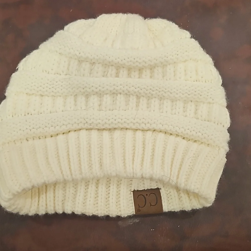 N White Knitted Hat C.C Brand No Size But Looks Great For Winter
